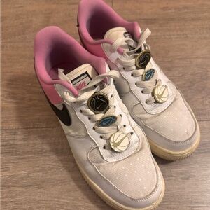 Nike Women's White and Pink Sneakers with Black Swoosh